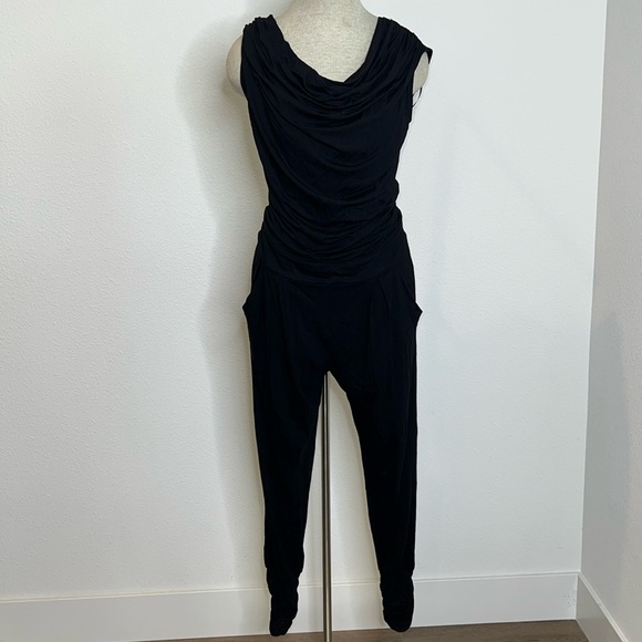 🔹 Les Lunes Sleeveless Drape Neck Jumpsuit